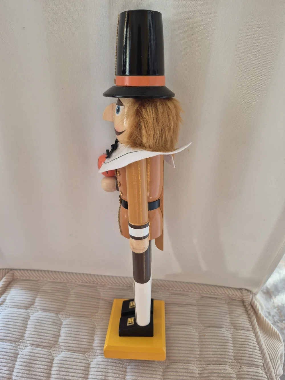 Wooden Pilgrim Nutcracker with Orange Hat and Pumpkin